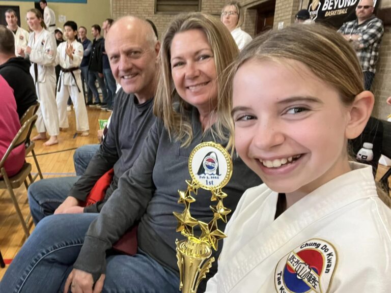 Young girl with 1st place trophy